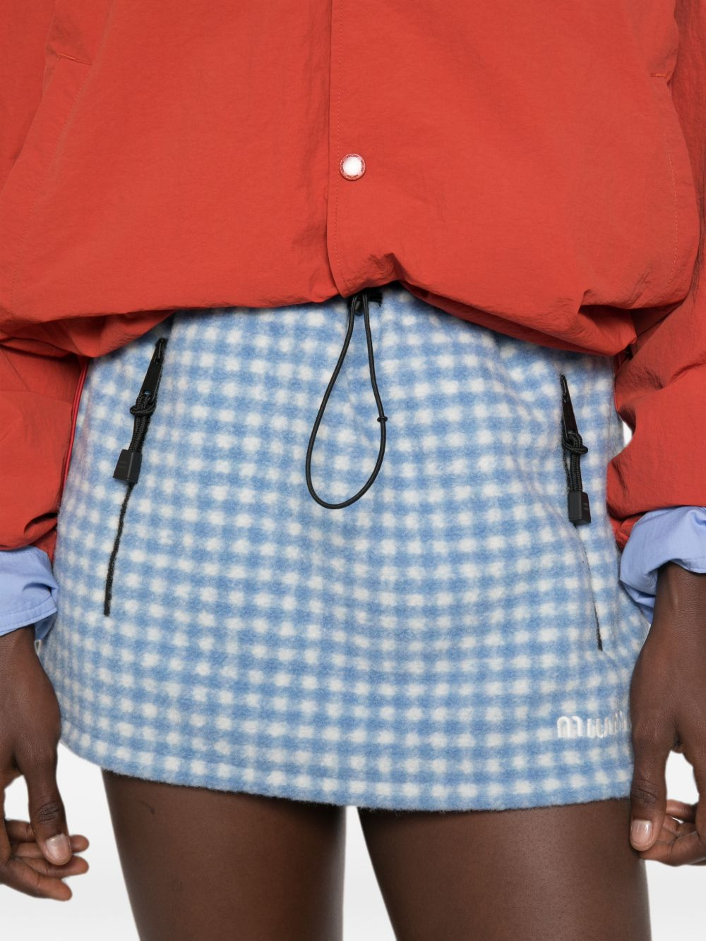 [Miu Miu] Mini skirt FW26 MG25186375F0UB3